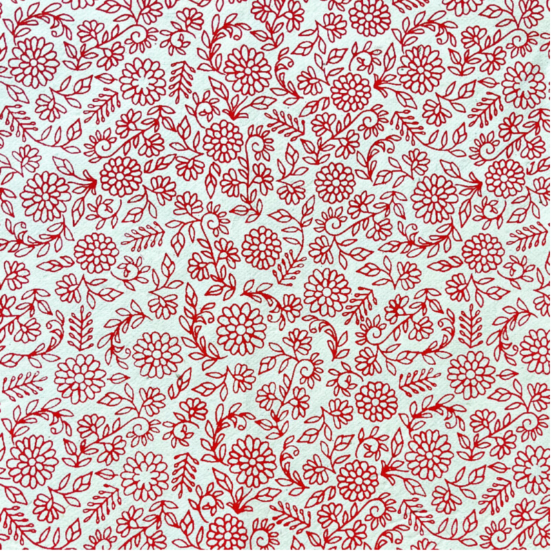 feuille de papier lokta fabriqué à la main au népal avec un motif de fleur rouge