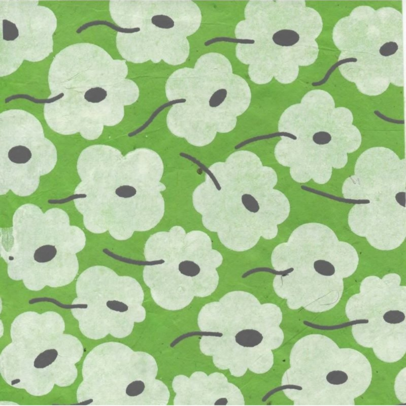 feuille de papier fabriqué au Népal à base de fibres de lokta motif fleurs blanches sur fond vert