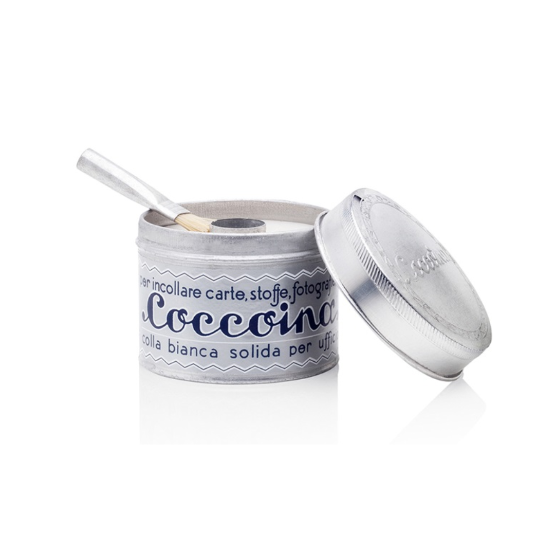 pote de colle blanche en pâte avec son petit pinceau
