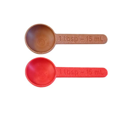 cuillère doseuse en plastique correspondant à 1cuillère à soupe