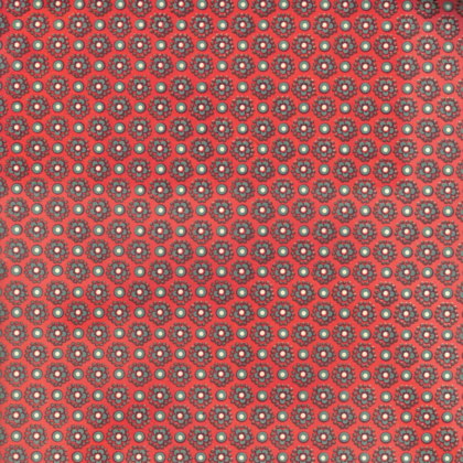 feuille de papier italien carta varese avec un motif de petites fleurs sur fond rouge